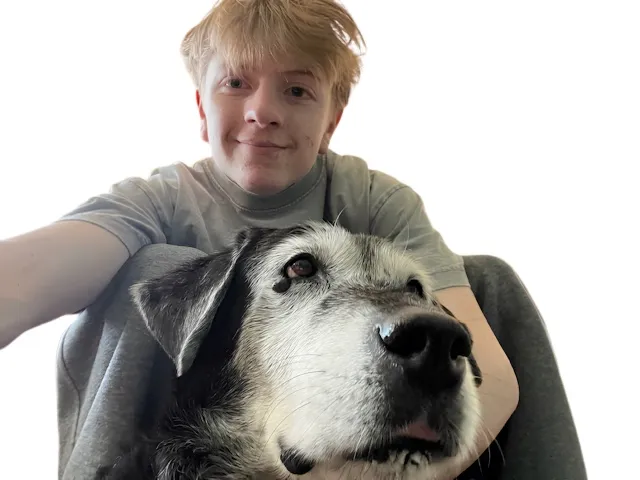 Ori of Workday Wags outdoors in downtown Minneapolis with Moki, their dog